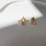 Berries örhängen i 18 karat förgyllt silver med svart onyx