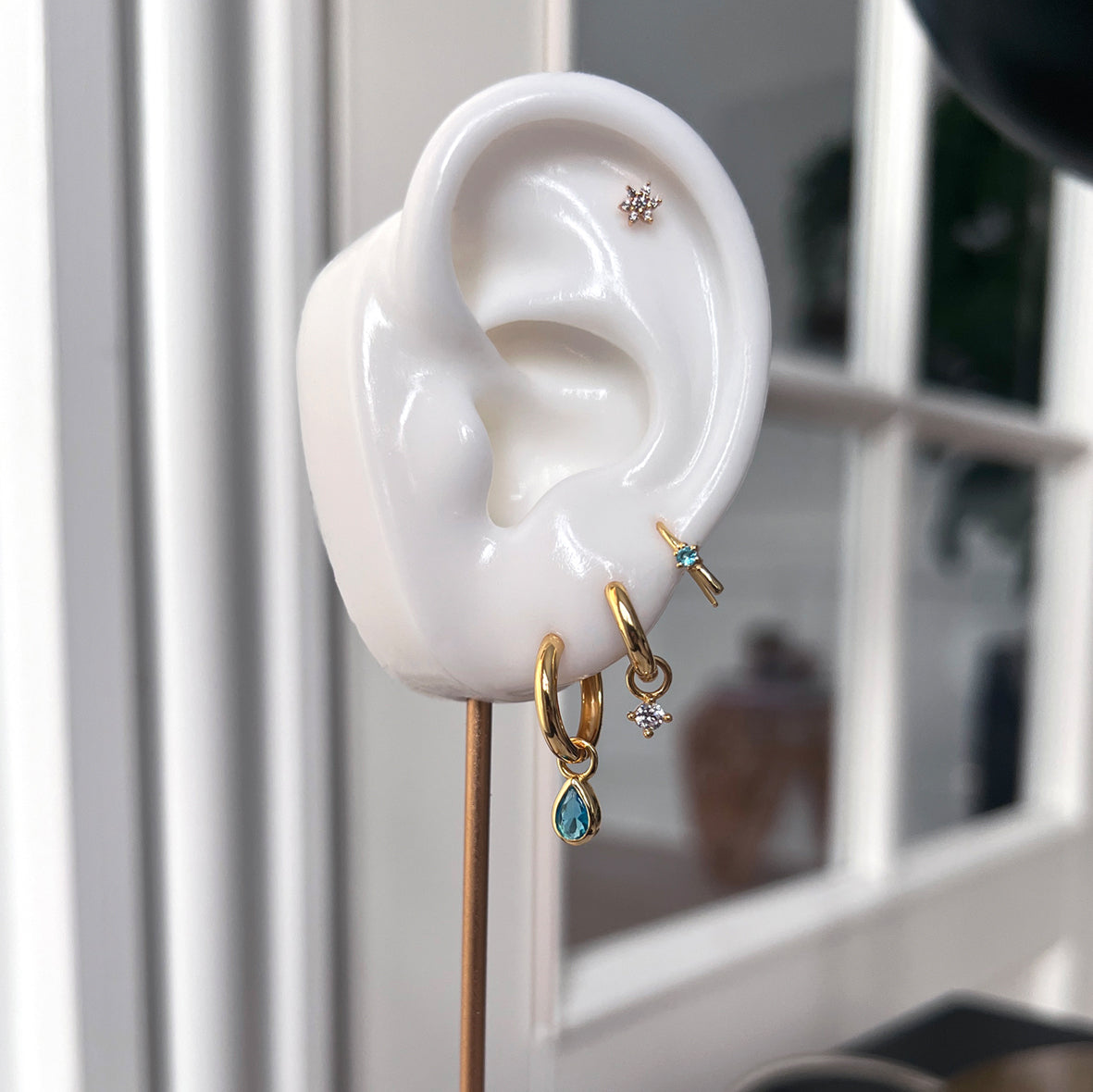 Individual zirkonia charm i 18 karat guldbelagt sølv