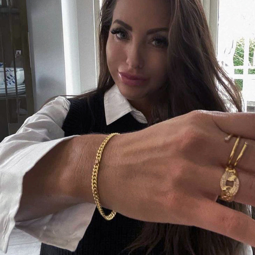 Infinity armbånd i 18 karat guldbelagt sølv med brillantslebet diamant